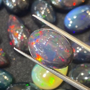 7.35 Carats Natural Ethiopian Black Opal Gemstone Oval Shape 16.08x11.67x8.26 MM Loose Stone for Jewelry Making, Healing Crystals