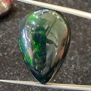 Natural Ethiopian Black Opal Gemstone Pear Shape 23.74x16.61x9.16 MM Loose Stone 14.60 Ct Healing Crystals Gift For Her for Jewelry Making