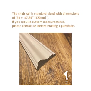 May include: White chair rail molding with a slightly rounded edge. The molding is 3 inches wide and 47.24 inches long, or 120 centimeters.
