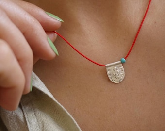 Silver &quot;Hands on Hips&quot; Pendant: Red Thread Necklace with Turquoise Bead