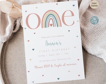 May include: A white invitation card with a rainbow and the word "one" in pink. The text on the card reads "Please join us to celebrate Amara's First Birthday, Sunday 1 August 12th 1pm, 123 Rainbow Lane, Melbourne VIC. Please RSVP to Kayla at [phone number]"