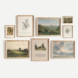 May include: A gallery wall featuring nine framed prints, including landscapes, botanical illustrations, and inspirational quotes. The frames are all a light wood colour and have a simple, rustic design.