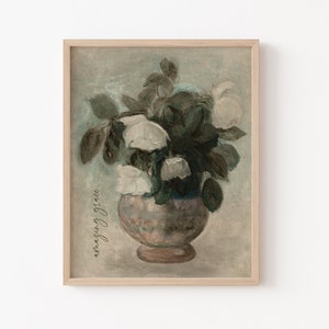 May include: A framed painting of a bouquet of white roses in a brown vase. The background is a light blue-green color. The text "amazing grace" is written vertically on the left side of the painting.