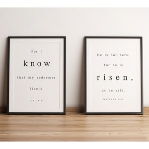 May include: Two black framed prints with white text on a white background. The left print reads "For I know that my redeemer liveth JOB 19:25". The right print reads "He is not here: for he is risen, as he said. MATTHEW 28:6".