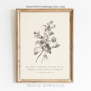 Puede incluir: Una impresi&oacute;n de arte imprimible con una ilustraci&oacute;n bot&aacute;nica en blanco y negro de flores y hojas. La impresi&oacute;n presenta el vers&iacute;culo b&iacute;blico "Mi gracia te basta, porque mi poder se perfecciona en la debilidad. 2 Corintios 12:9".