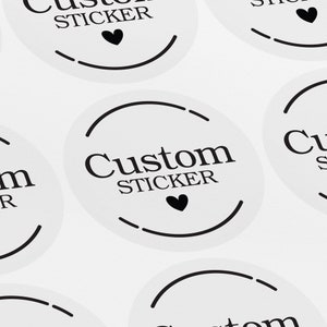 May include: White round stickers with black text that says "Custom Sticker" and a small black heart.