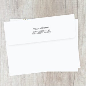 May include: White envelope with a black return address label. The label reads "FIRST LAST NAME, 2328 SAN PABLO ST NE, ALBUQUERQUE, NM 87110".