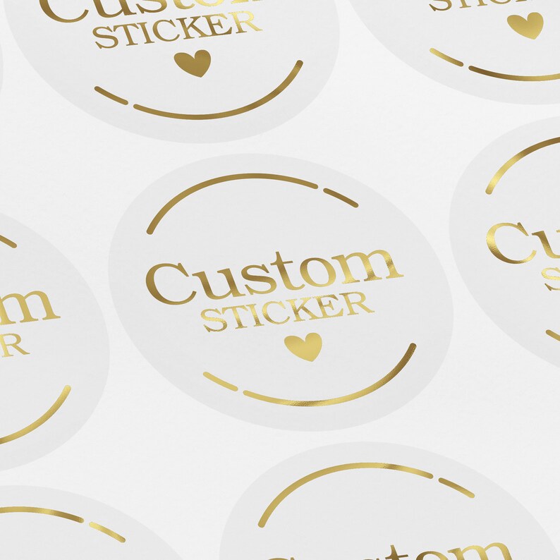 May include: White round stickers with gold lettering that says "Custom Sticker" and a small gold heart.