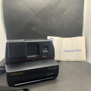 Polaroid Impulse Portrait. Instant Film Camera. Vintage Instant Camera. Black.
