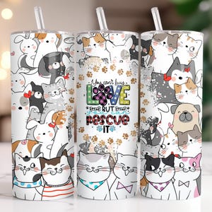 May include: Three white stainless steel tumblers with a colorful cartoon design of cats and dogs. The middle tumbler has the text "You can't buy love but you can rescue it" with a paw print and plaid design.