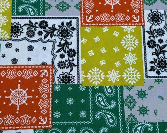 Groene patchwork bloemenstof