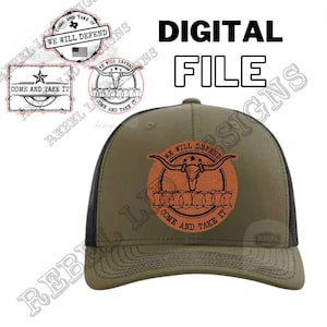 May include: A green and black trucker hat with a brown leather patch featuring a bull skull and the text "We Will Defend Come And Take It".