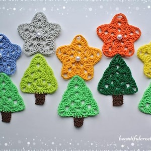 May include: A collection of crocheted Christmas tree and star ornaments in various colors, including green, blue, yellow, orange, and gray. Each ornament features a white pearl bead in the center.