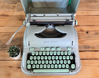 Hermes 3000 typewriter with leather case