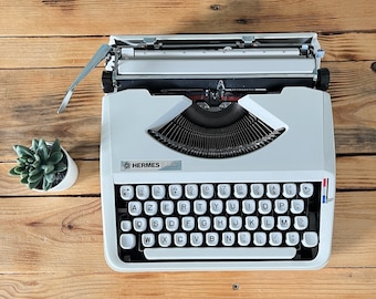 Hermès baby white typewriter