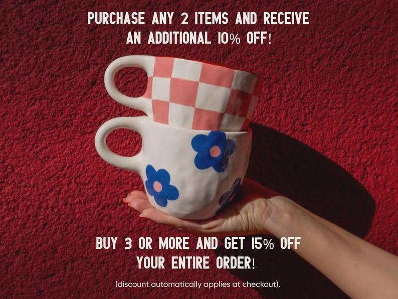May include: Two ceramic mugs stacked on top of each other, held by a hand. The top mug has a pink and white checkered pattern, while the bottom mug is white with blue flower designs. Text on the image reads: "PURCHASE ANY 2 ITEMS AND RECEIVE AN ADDITIONAL 10% OFF!" and "BUY 3 OR MORE AND GET 15% OFF YOUR ENTIRE ORDER!"