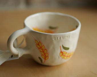 Ukrainian ceramic artisan mug with hand painted wheat art, handmade pottery, clay coffee cup