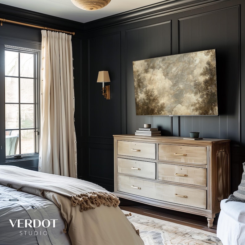 May include: A dark wood dresser with six drawers in a bedroom with a large window and white curtains. The dresser has a light wood finish and gold hardware. A painting hangs above the dresser.