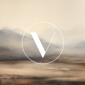 May include: A white letter V in a circle against a background of a hazy, brown landscape with mountains in the distance.
