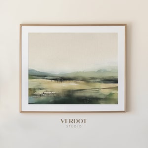 May include: A framed abstract landscape painting with muted green and brown tones. The painting is in a gold frame and has a white mat. The text "VERDOT STUDIO" is printed below the frame.