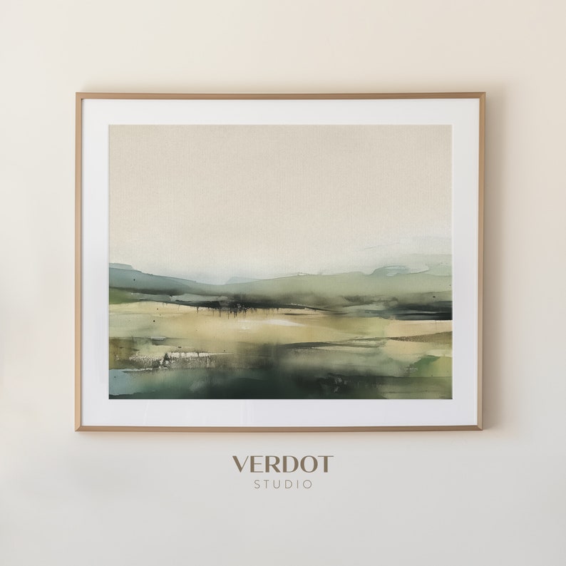 May include: A framed abstract landscape painting with muted green and brown tones. The painting is in a gold frame and has a white mat. The text "VERDOT STUDIO" is printed below the frame.