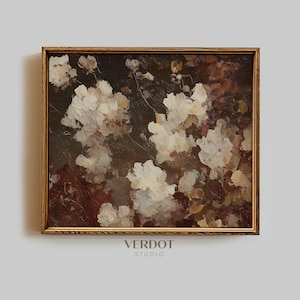 May include: An oil painting featuring white flowers and brown and dark green foliage, set within a gold-coloured wooden frame. The artwork has a vintage aesthetic, with the text "VERDOT STUDIO" visible.
