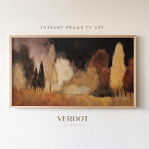 Peut inclure: Peinture de paysage encadrée représentant une scène de forêt avec des arbres dans des tons de marron, de jaune et de blanc. L'œuvre a un fond sombre et le texte "INSTANT FRAME TV ART" et "VERDOT STUDIO".