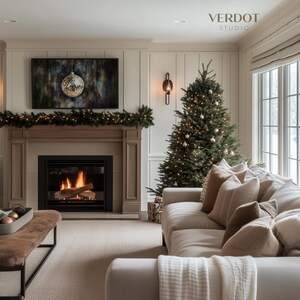 May include: A living room with a fireplace, a Christmas tree, and a couch with throw pillows. The fireplace has a mantel with a garland of lights and a painting above it. The Christmas tree is decorated with white ornaments and lights. The couch is beige and has a white throw blanket on it. The text "VERDOT STUDIO" is visible in the upper right corner of the image.