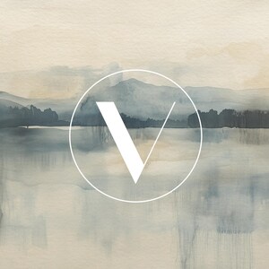 May include: A watercolor painting of a landscape with a lake and mountains in the background. A white circle with a white letter "V" inside is in the foreground.