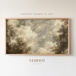 以下が含まれることがあります： 曇った空と、落ち着いた茶色とベージュの色合いで描かれた、ヴィンテージな風景画の額装プリント。絵画は明るい木製の額縁に収められています。