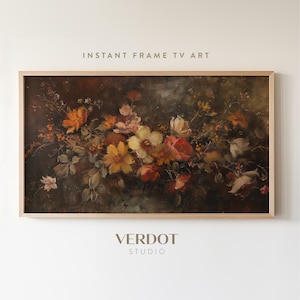 Puede incluir: Una pintura enmarcada de un bodegón con un ramo de flores coloridas en tonos rojos, amarillos, blancos y rosas. Las flores están dispuestas en un jarrón y están rodeadas de hojas verdes. El fondo es de color marrón oscuro.