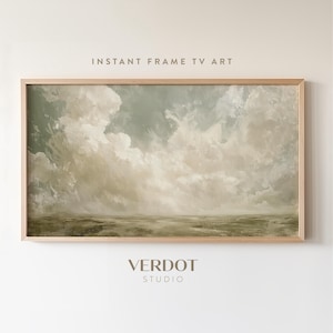 Peut inclure: Une peinture abstraite encadrée d'un ciel nuageux dans un schéma de couleurs vert clair et beige. La peinture est dans un cadre en bois clair.