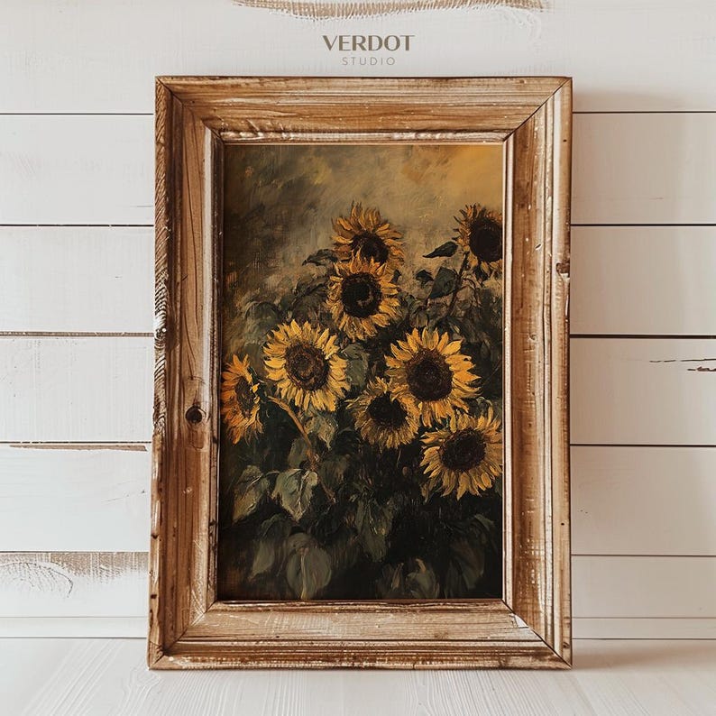 May include: A framed painting of a bouquet of sunflowers in shades of yellow and brown. The sunflowers are arranged in a vase and are surrounded by green leaves. The painting is set against a light brown background.