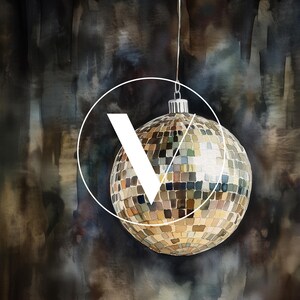 May include: A gold disco ball ornament hanging from a string against a dark brown watercolor background.