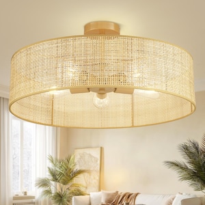 May include: A round, natural-toned rattan ceiling light fixture. The light has a woven shade and a wooden base. The fixture has multiple light bulbs and is designed for indoor use. The light is a warm, neutral color and would complement a variety of interior design styles.