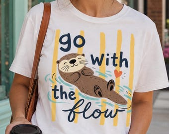 Camiseta "Go With the Flow" con estampado de nutria / Camiseta relajada con estampado de nutria