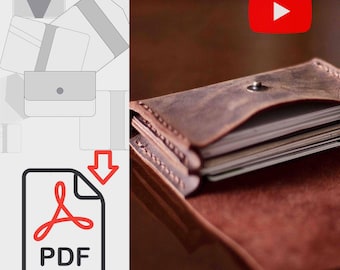 May include: A brown leather wallet with a flap and a snap closure. The wallet is open and shows multiple cards inside. A PDF download icon is in the upper left corner of the image. A YouTube play button is in the upper right corner of the image.