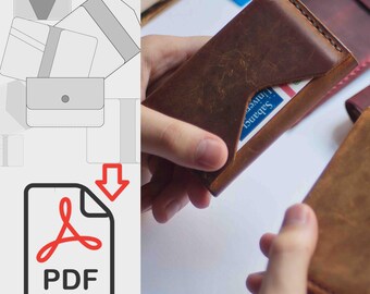 May include: A brown leather wallet with a card slot and a flap that folds over. The wallet is being held in a hand and a card is visible inside the slot.