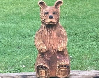 Chainsaw carved sitting bear