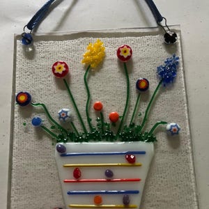 Handmade Fused Glass Sun-catcher featuring colorful flowers in a pot