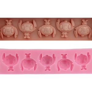 May include: Pink silicone mould with six cavities shaped like Stitch from Lilo & Stitch. The mould is designed for making cake pops, chocolate, or other treats.
