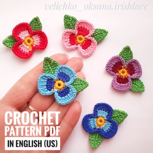 かぎ針編みのパンジーとビオラのパターン パンジーの花のかぎ針編みの花のパターン かぎ針編みの花のアップリケ アイルランドのレースのパターン アイルランドのかぎ針編みの花