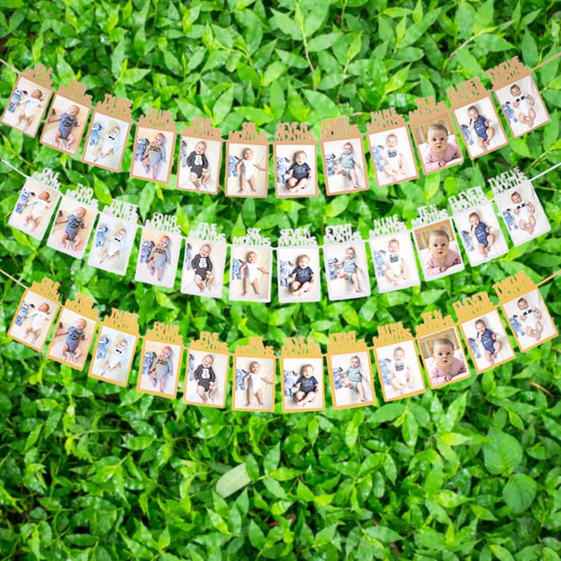 May include: A gold and white photo banner with 12 photo slots for a baby's first year. Each slot has a number and the words "months" or "one year".
