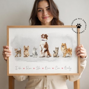 May include: A framed custom pet portrait featuring watercolor illustrations of six pets: cats and dogs. The pets are arranged in a row, with their names written below. The frame is made of light-colored wood, and the background is a soft watercolor wash.