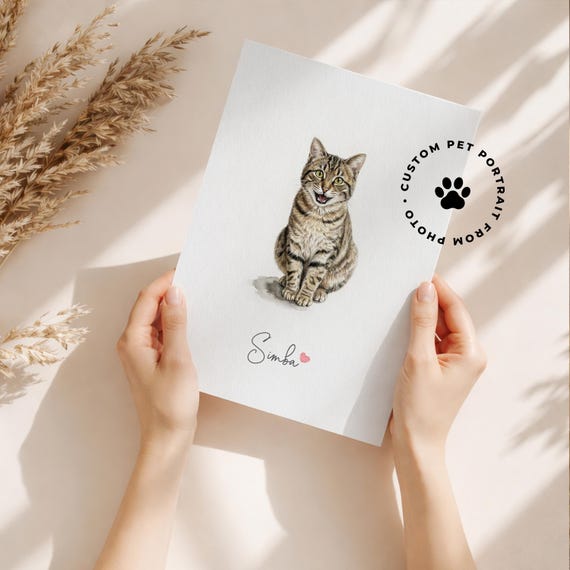 A real artist paints your specific pet in miniature watercolor — the 'tiny portrait of my dog' gift that pet owners melt over.