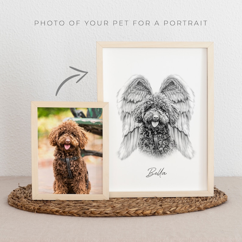 May include: A framed black and white drawing of a dog with angel wings. The dog is a brown poodle with its tongue sticking out. The drawing is titled "Bella".