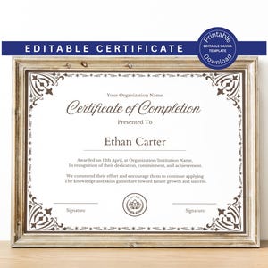 May include: A framed certificate of completion with the text "Certificate of Completion" and "Ethan Carter" displayed prominently. The frame is a light brown color, and the certificate has decorative corner designs. The words "EDITABLE CERTIFICATE" are at the top.