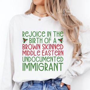 Rejoice In The Birth Of A Brown Skinned Middle Eastern Undocumented Immigrant Comfort Colors® Long Sleeve Tee, Jesus Wasn&#39;t White T-Shirt