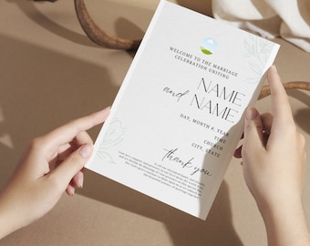 Könnte beinhalten: Eine weiße Hochzeitseinladung mit einem schlichten Design, das ein grünes Feld mit blauem Himmel und einer weißen Wolke zeigt. Die Einladung enthält den Text "Willkommen zur Hochzeitsfeier, die vereint" gefolgt von den Namen des Paares und dem Datum, der Uhrzeit, der Kirche, der Stadt und dem Bundesstaat. Der Text "Vielen Dank" befindet sich am unteren Rand der Einladung.