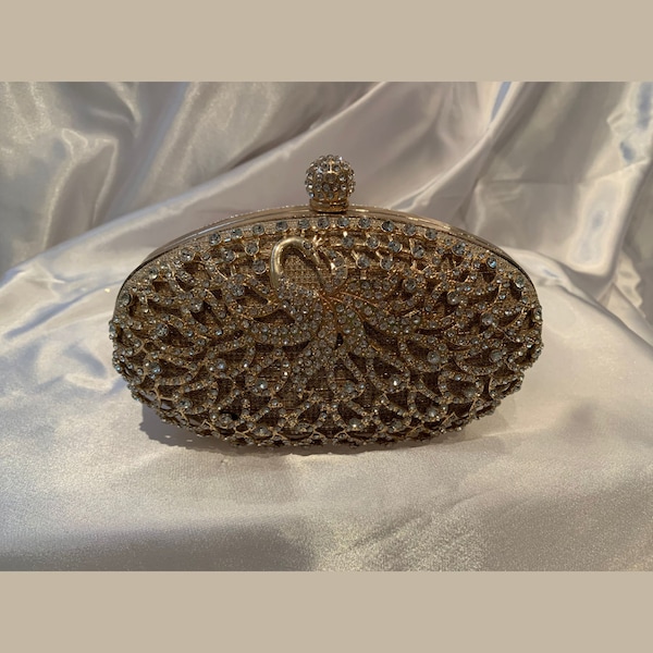 Gorgeous Golden Clutch with Rhinestones and a Golden Handle